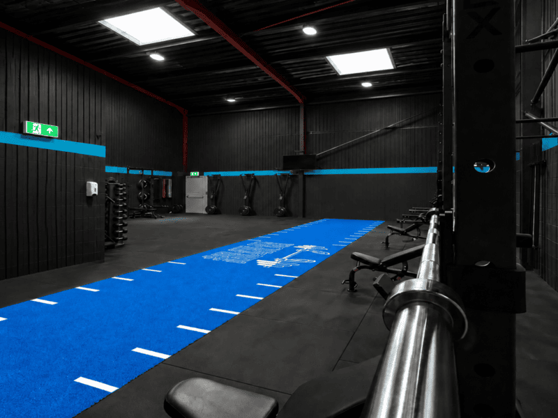 close-up of industrial gym turf backing and integrated foam padding